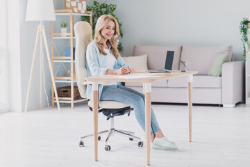Full size profile side photo of smiling businesswoman company ceo executive director sign document contract in workstation