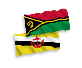 National vector fabric wave flags of Republic of Vanuatu and Brunei isolated on white background. 1 to 2 proportion.