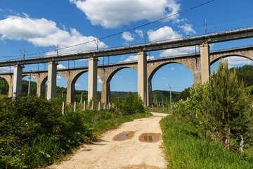 Two railway bridges. Railway viaduct in Krasnoufimsk, Sverdlovsk region, Russia