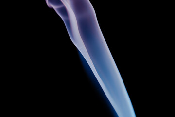 Obraz premium Abstract colorful smoke on a black background. Isolated.