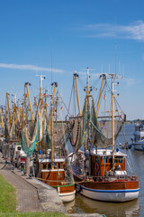 View towards shrimp cutters in the port of Greetsiel / Germany in East Frisia 