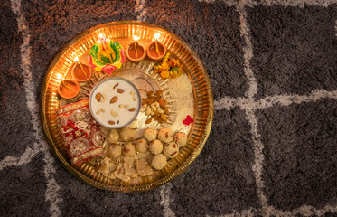 isolated diwali cultural praying decorated plat for hindu goddess lakshmi