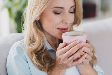 Photo portrait woman blonde hair enjoying coffee aroma drinking beverage relaxing alone