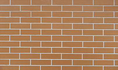 Fototapeta premium Pattern of brown tiles lined with white trim. Photophone, background, brickwork