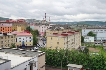  Russia, Murmansk region. Kirovsk. View of the residential part of the city of Kirovsk on a cloudy summer day. Khibiny Mountains