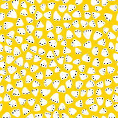 Abstract floral seamless repeat pattern. Random placed, vector flying abstract shapes with small black dots all over print on yellow background.