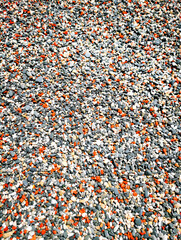 Small colored pebbles, red, white, gray