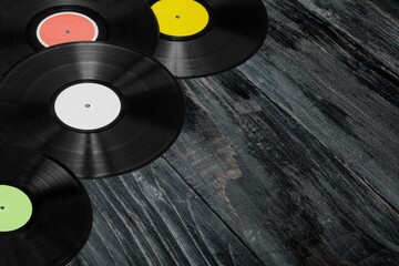 Multi colored vinyl records on a background. Retro or music concept