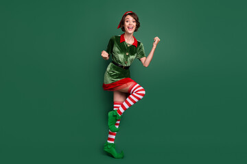 Full length body size view of attractive lucky girl dancing having fun rejoicing isolated over...