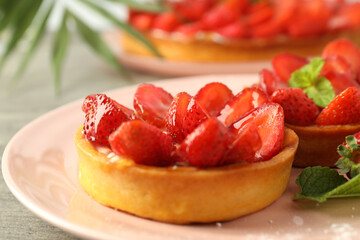 Concept of tasty food with strawberry tarts, close up