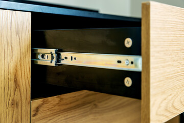 opened drawer with ball bearing slides. furniture hardware