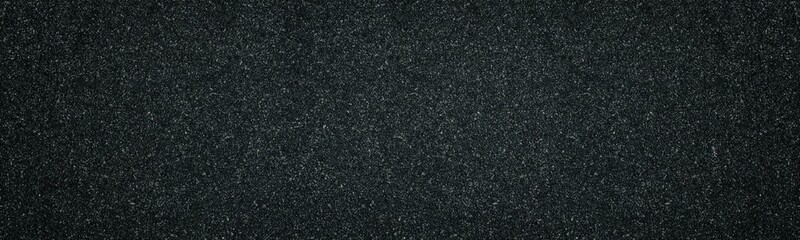 Wide black texture. Dark gray textured surface panorama. Abstract grey panoramic background