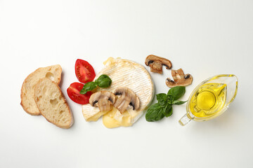 Concept of tasty food with grilled camembert on white background