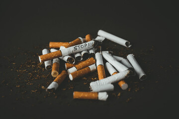 A bunch of scattered gobies and among them a cigarette