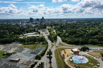 Above Greensboro on partly cloudy day - obrazy, fototapety, plakaty