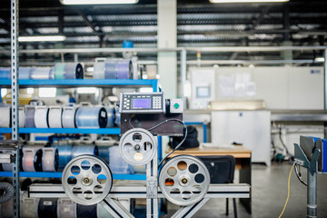 machine for the production of fiber optic cable at the factory, production of wires for telecommunications and Internet networks.