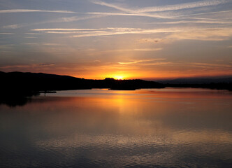 Wonderful Colourful Sunset At The Lake Bras De L'Etang In St. Aygulf France On A Beautiful Summer Day With A Clear Blue Sky