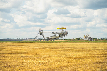 Earthmoving machine in an opencast mine