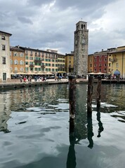 old buildings in the harbour of riva del garda lake