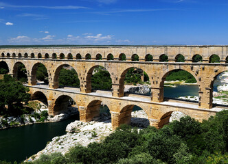 Fototapeta na wymiar Famous Ancient Roman Bridge Pont Du Gard France On A Beautiful Summer Day With A Clear Blue Sky