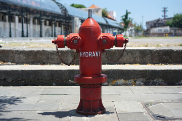 Red hydrant on the sidewalk