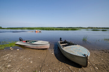Boats on the banks of the Onega River. Country life. Russia, Arkhangelsk region 