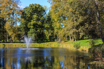 pond and fountain in the city park 