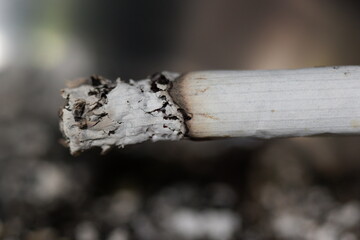 a cigarette burned by a smoker