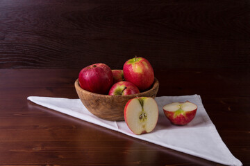red apples on a wooden table