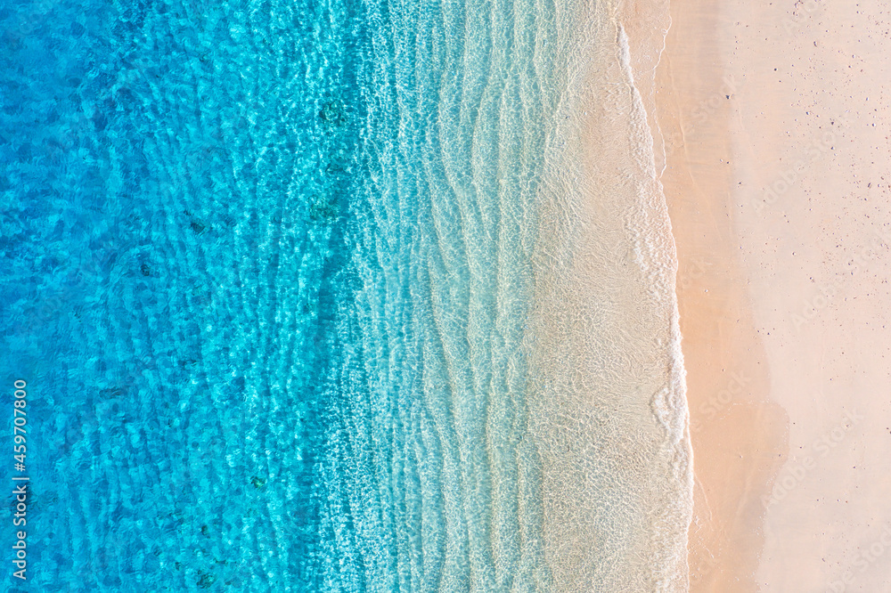 Wall mural beach and ocean as a background from top view. azure water background from top view. summer seascape
