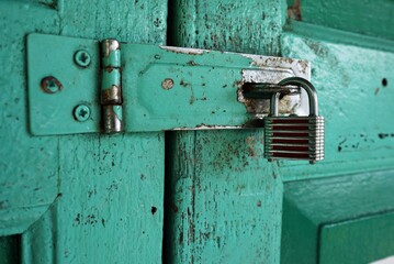 Rustic wooden door with key lock - 459708063