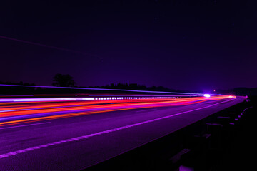 Night road lights. Lights of moving cars at night. long exposure red, blue, green © Remigiusz Góra