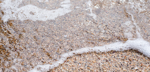 Water surface bubble on the natural outdoor sand surface