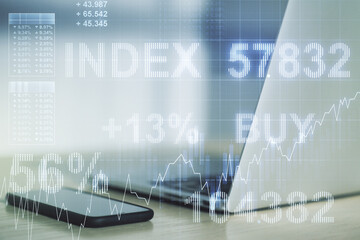 Abstract creative financial graph on modern laptop background, forex and investment concept. Multiexposure
