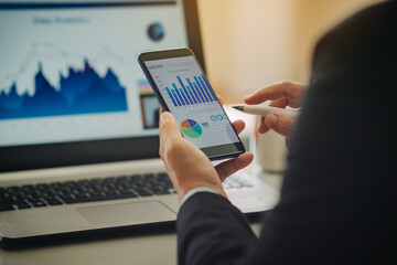 businessman investment consultant analyzing company annual financial report balance sheet statement...
