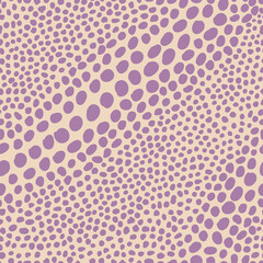 Seamless pattern of asymmetric blots similar to animal skin or scales.