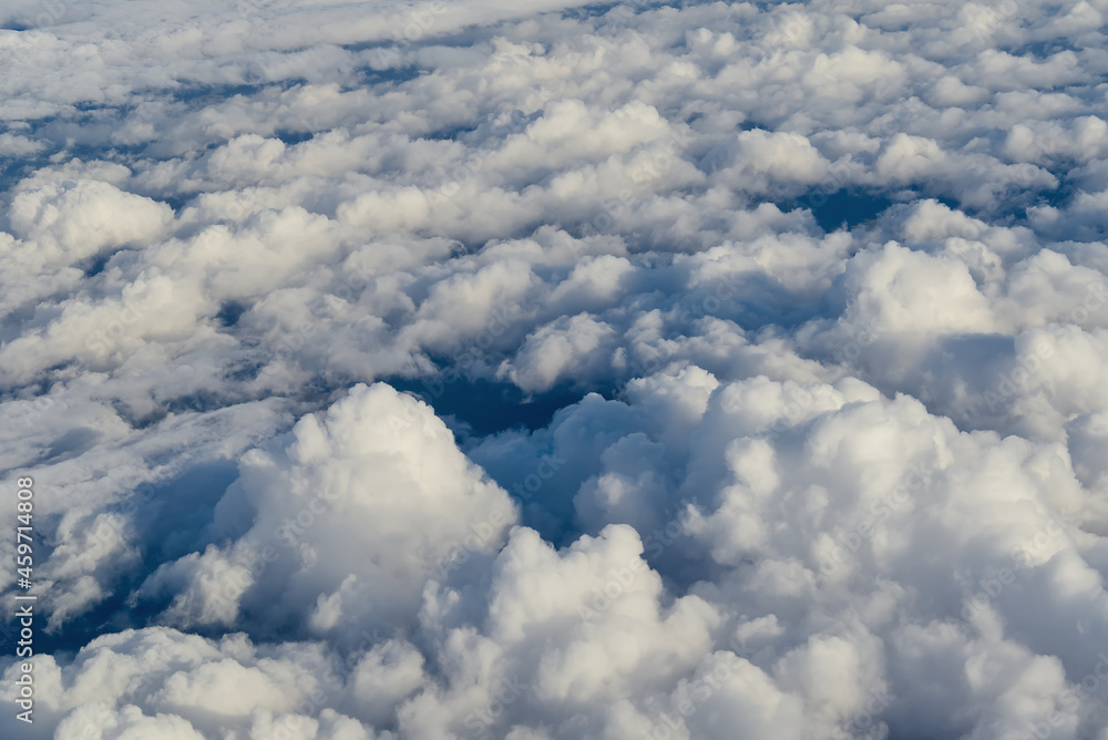 Aufkleber view of the sky above the clouds. blue sky high view from airplane window clouds shapes. sky-clouds 