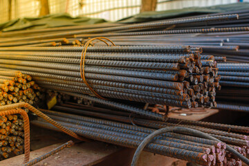 Reinforcement steel rod and deformed bar with rebar at construction site.