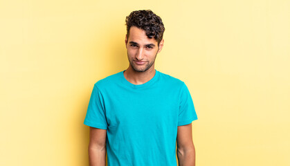 hispanic handsome man looking proud, confident, cool, cheeky and arrogant
