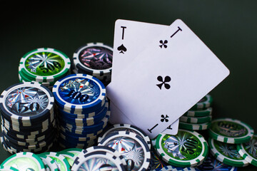 Obraz premium poker chips stack with two cards an ACE