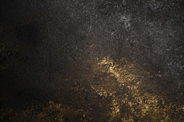 beautiful abstract dark textured background with gold