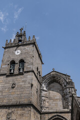 Fototapeta na wymiar Church of Our Lady of Oliveira (Nossa Senhora da Oliveira) in Guimaraes, Portugal. Nossa Senhora da Oliveira - one of the most significant examples of Gothic architecture in north of country.