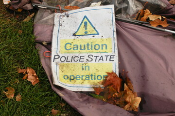 Discarded sign after a protest march, London, United Kingdom.