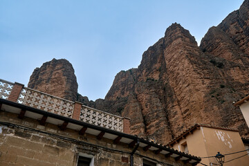 Houses below the Mallos de Riglos, Riglos, province of Huesca, Aragon, Spain.