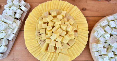 various cheese pieces cheese on a platter