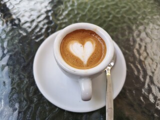 coffee with milk in the shape of a heart