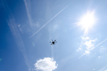 Drone flies in the sky