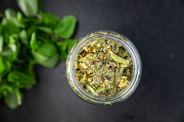 herbal tea medicinal herbs, leaves, flowers fresh portion ready to eat meal snack on the table copy...