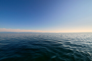 Water surface and clear sky