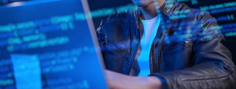 Programmer hacker typing computer hacking coding on laptop computer, internet metaverse digital technology data analytic concept. 